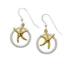 Two tone dancing starfish drop earrings. Pewter with silver and gold finish. USA made, wholesale